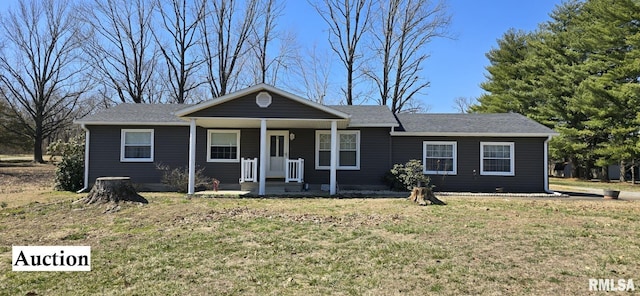 ranch-style home with a porch and a front lawn