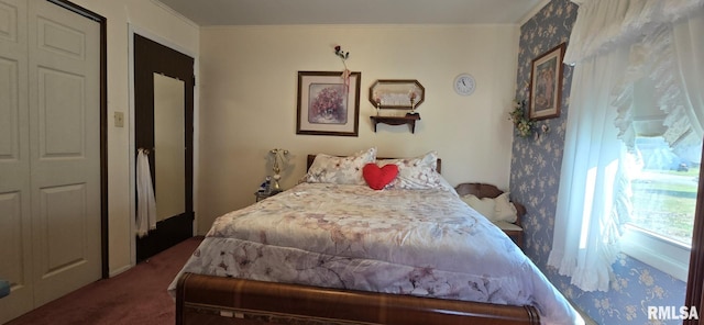 bedroom with carpet floors and ornamental molding