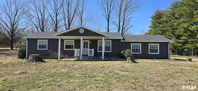 ranch-style home with a porch and a front yard