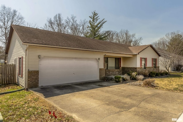 ranch-style home with brick siding, an attached garage, concrete driveway, and roof with shingles