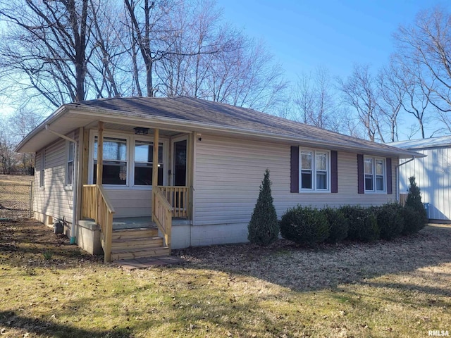 view of front of property with a front lawn