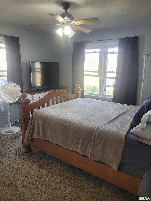 bedroom featuring carpet floors and a ceiling fan