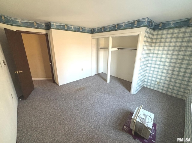 unfurnished bedroom featuring carpet flooring and wallpapered walls