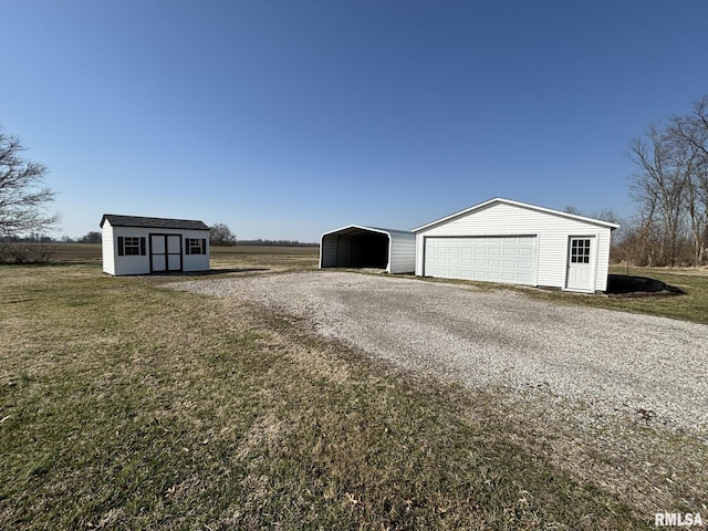 garage featuring a carport