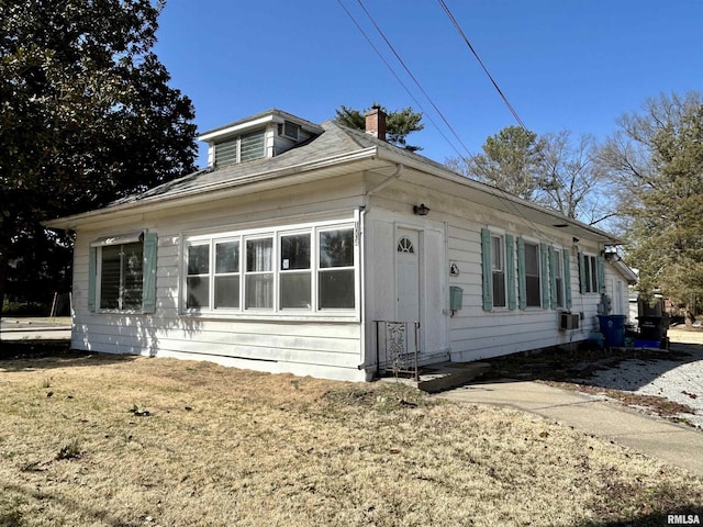 view of front of house with a chimney