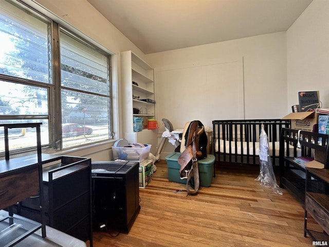 home office featuring wood finished floors