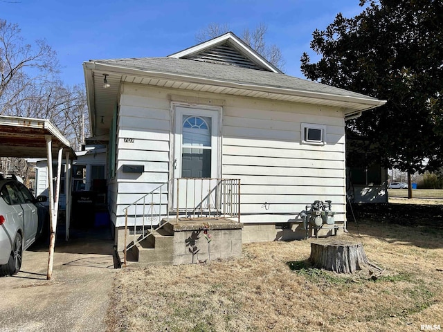 view of outdoor structure with a carport