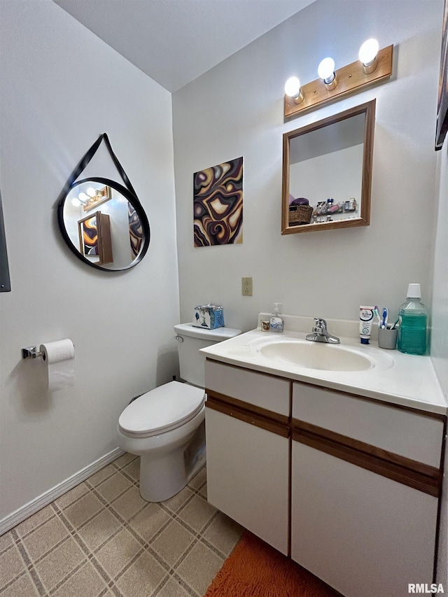 half bath with toilet and vanity