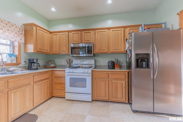 2814 Chouteau Ave, Odin, IL 62870 - kitchen featuring a sink, light countertops, recessed lighting, and stainless steel appliances