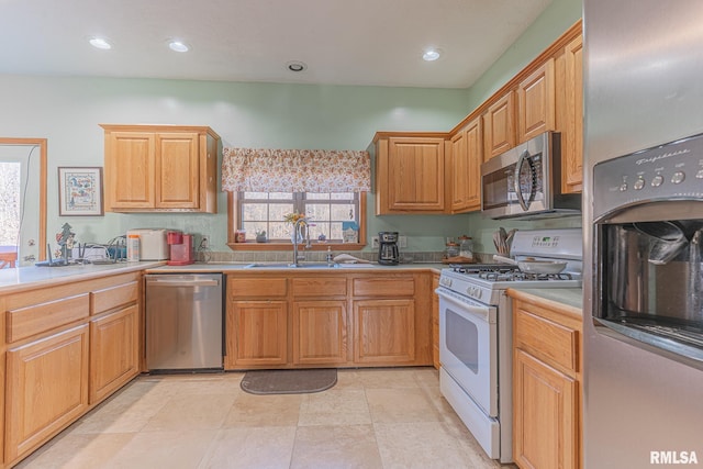 2814 Chouteau Ave, Odin, IL 62870 - kitchen with a sink, light countertops, recessed lighting, and stainless steel appliances
