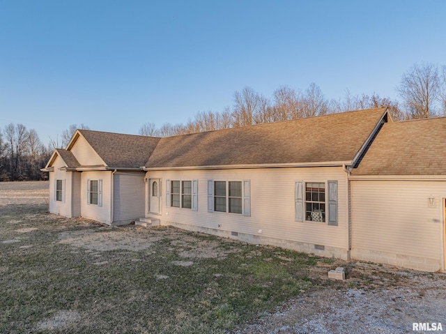 2814 Chouteau Ave, Odin, IL 62870 - back of property featuring a yard, a shingled roof, and crawl space