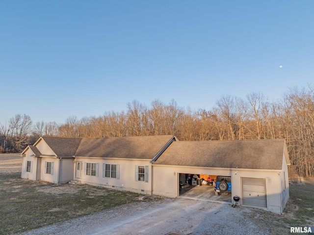 2814 Chouteau Ave, Odin, IL 62870 - view of front facade with crawl space, a garage, and dirt driveway