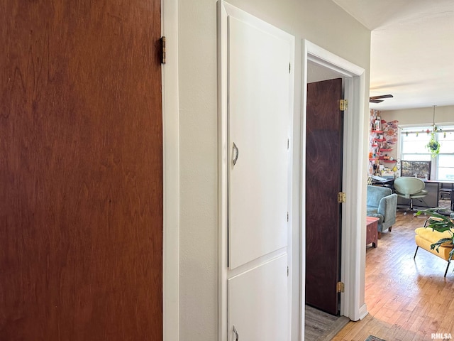 hall with light wood-style flooring