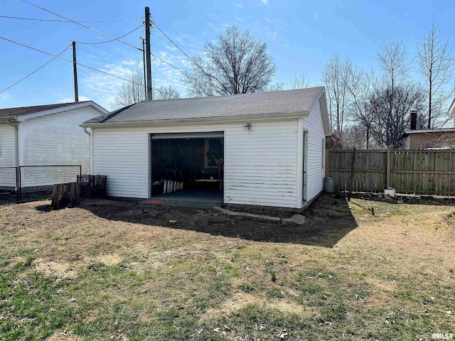 garage featuring fence