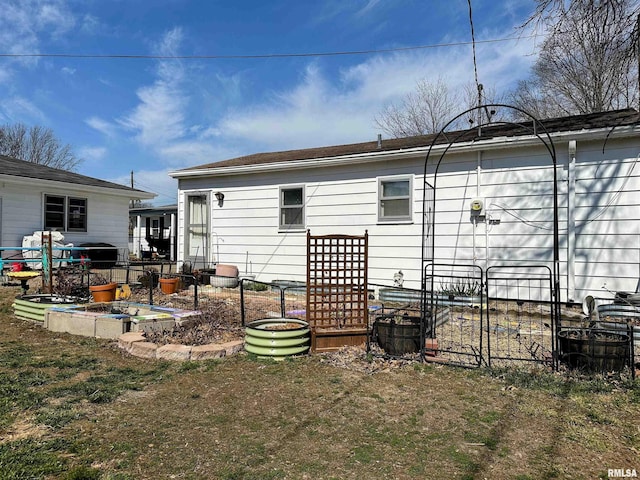 rear view of house with a patio