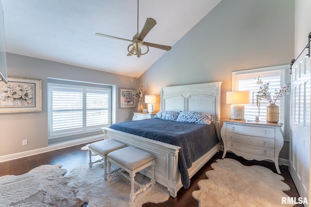 bedroom with baseboards, high vaulted ceiling, wood finished floors, and a ceiling fan