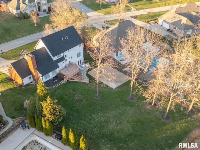birds eye view of property with a residential view