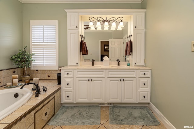 bathroom featuring a sink, a bath, and tile patterned floors
