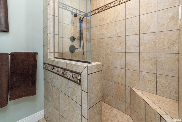 bathroom with a walk in shower