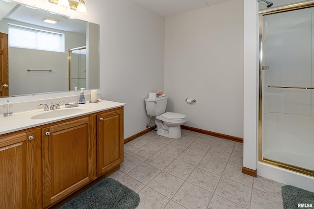 full bath featuring toilet, a stall shower, tile patterned flooring, baseboards, and vanity