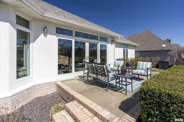 view of patio featuring french doors