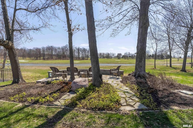 view of yard featuring a fire pit