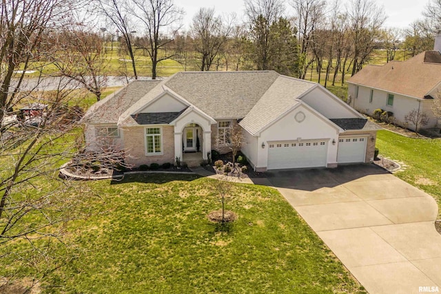 ranch-style house with a shingled roof, concrete driveway, a front yard, stucco siding, and an attached garage