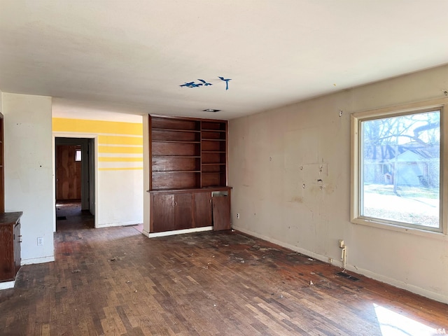 607 S Skyline Dr, Carbondale, IL 62901 - spare room featuring visible vents, baseboards, and wood finished floors