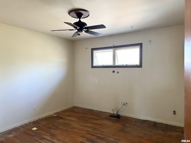 607 S Skyline Dr, Carbondale, IL 62901 - unfurnished room featuring dark wood-style floors, baseboards, and ceiling fan