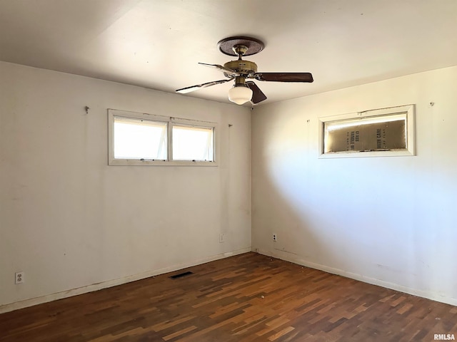 607 S Skyline Dr, Carbondale, IL 62901 - unfurnished room with visible vents, baseboards, wood finished floors, and a ceiling fan
