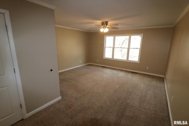 914 Valley Dr, Carterville, IL 62918 - unfurnished room featuring baseboards, ornamental molding, ceiling fan, and carpet