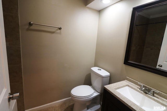 914 Valley Dr, Carterville, IL 62918 - bathroom featuring tile patterned floors, toilet, and vanity