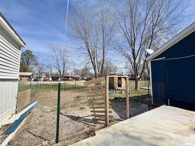 710 S Maple St, Cambria, IL 62915 - view of yard featuring an outdoor structure and fence