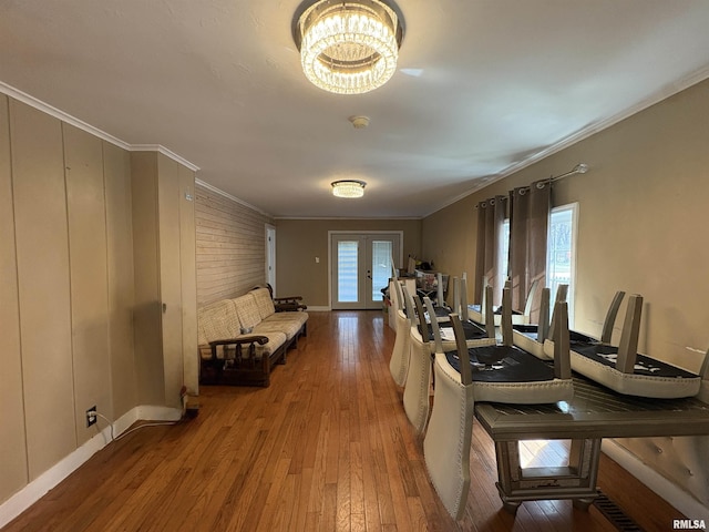 710 S Maple St, Cambria, IL 62915 - living area featuring a wealth of natural light, french doors, crown molding, and hardwood / wood-style floors