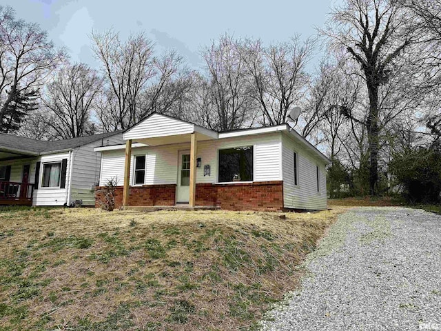 view of front of house with brick siding