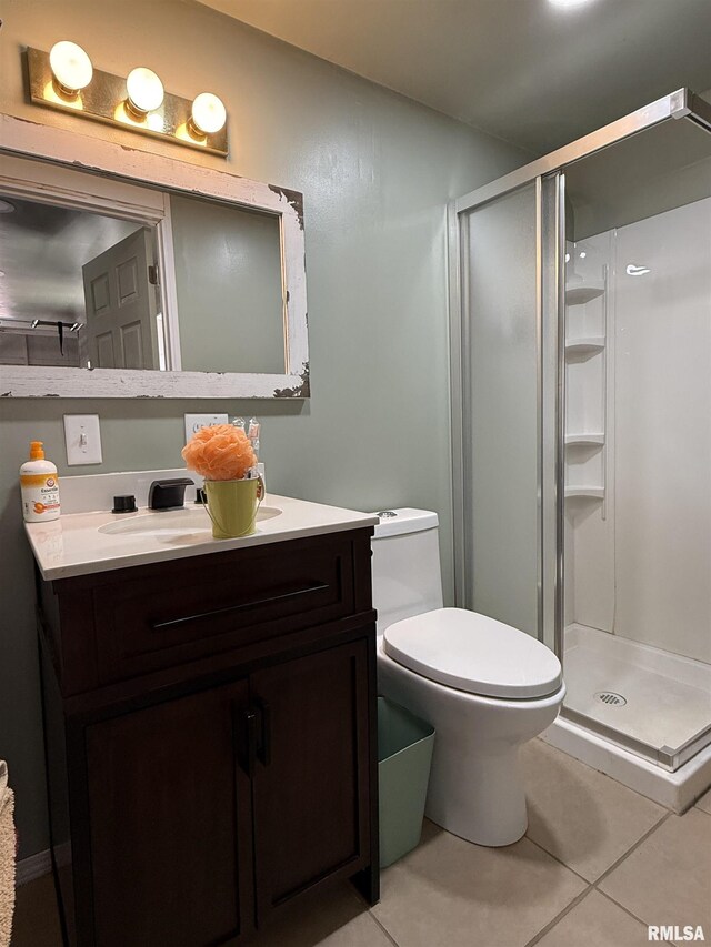 6180 Reevesville Rd, Grantsburg, IL 62943 - bathroom with tile patterned flooring, a stall shower, vanity, and toilet