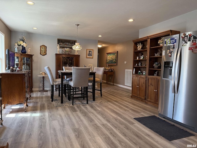 6180 Reevesville Rd, Grantsburg, IL 62943 - dining space featuring light wood-type flooring, recessed lighting, and baseboards