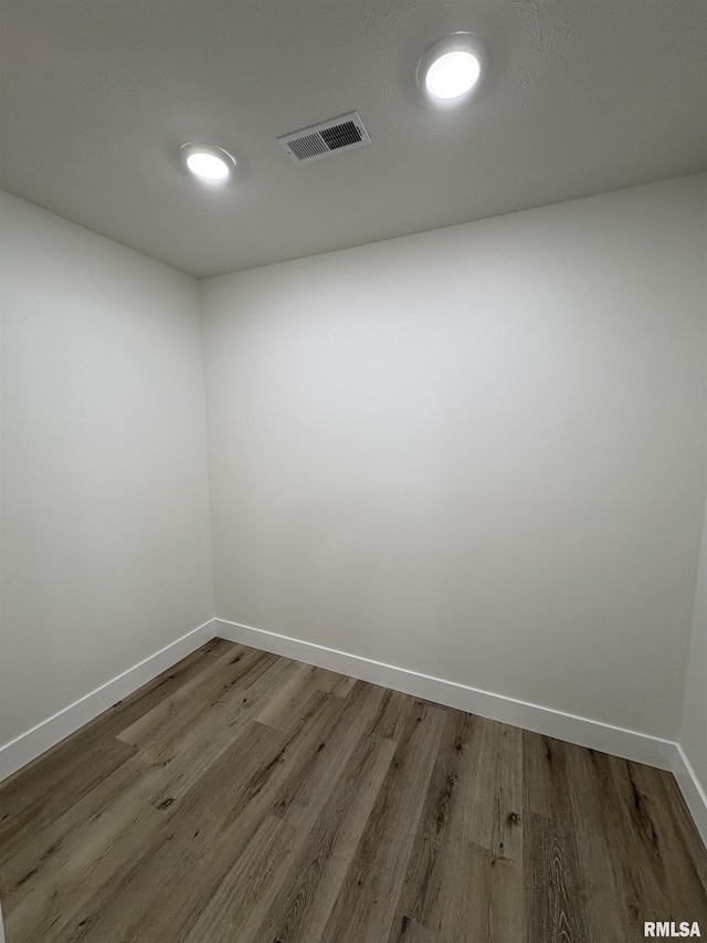 209 Madison St, Cambria, IL 62915 - unfurnished room with wood finished floors and baseboards
