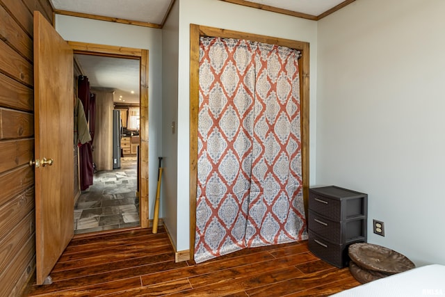 320 Nelson Ln, Grantsburg, IL 62943 - unfurnished bedroom with crown molding and dark wood finished floors