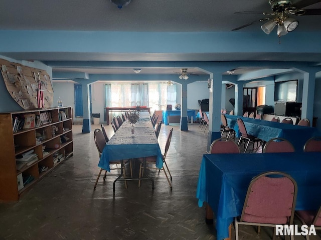 dining room featuring ceiling fan