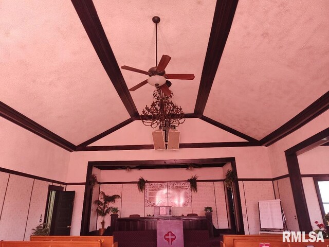 details featuring beamed ceiling, ornamental molding, and a ceiling fan