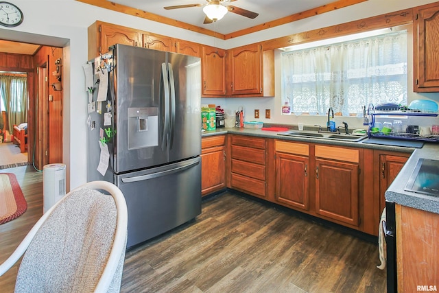 125 Central Hill Rd, Grantsburg, IL 62943 - kitchen with stainless steel fridge, a ceiling fan, a sink, dark wood-style floors, and brown cabinetry