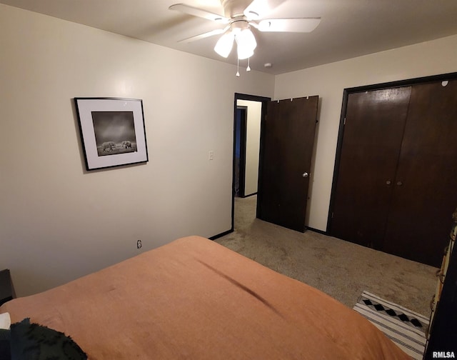 unfurnished bedroom featuring light colored carpet and ceiling fan