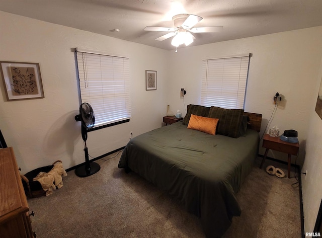 carpeted bedroom featuring a ceiling fan