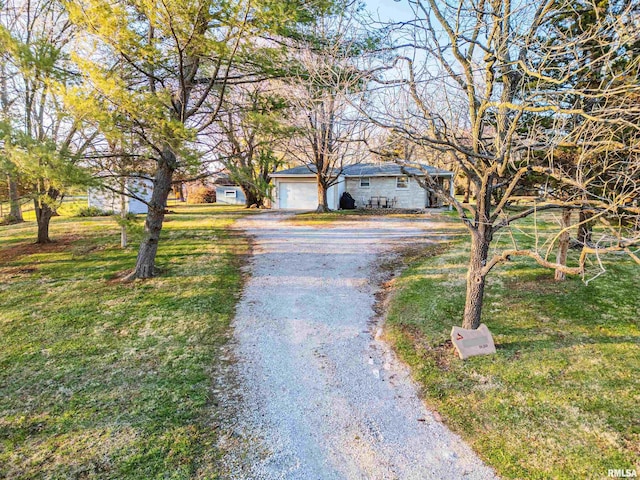 view of road featuring driveway