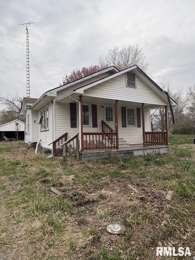 view of front of home featuring covered porch