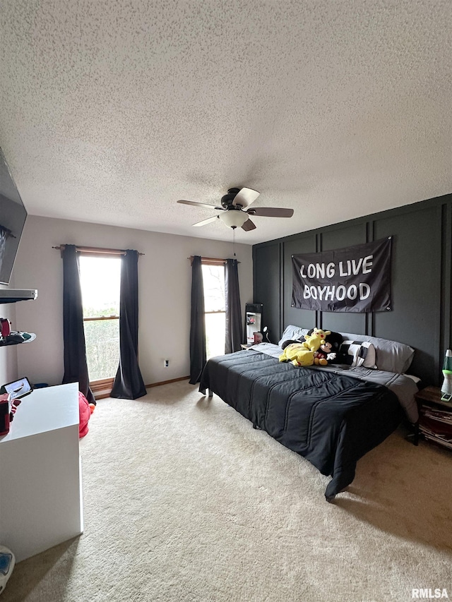 701 Rachael Ct, Carterville, IL 62918 - bedroom featuring carpet, a textured ceiling, and ceiling fan