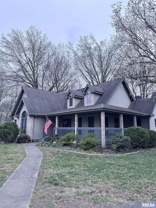 701 Rachael Ct, Carterville, IL 62918 - view of front of property with a front yard, covered porch, and brick siding