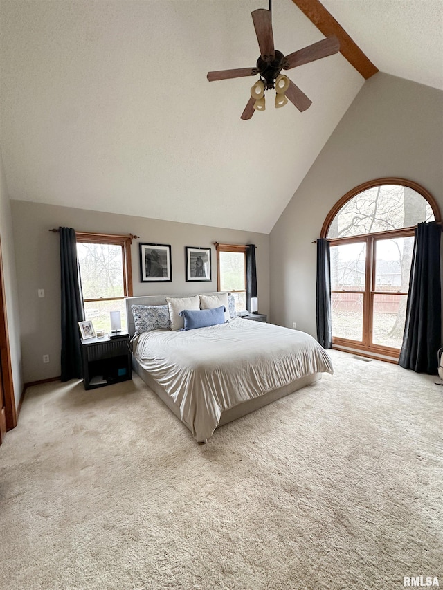 701 Rachael Ct, Carterville, IL 62918 - bedroom featuring light colored carpet, high vaulted ceiling, ceiling fan, and a textured ceiling