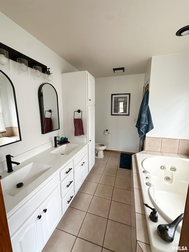 701 Rachael Ct, Carterville, IL 62918 - full bath featuring a tub with jets, tile patterned floors, a sink, and double vanity